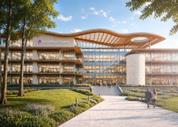 Architectural rendering of Bristol Myers Squibb's planned Houston manufacturing campus, with people walking a path toward the entrance